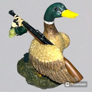 Mallard Duck Runaway with Gun and Pouch Sack Ceramic